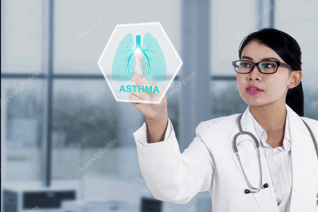 Female doctor with virtual lungs symbol