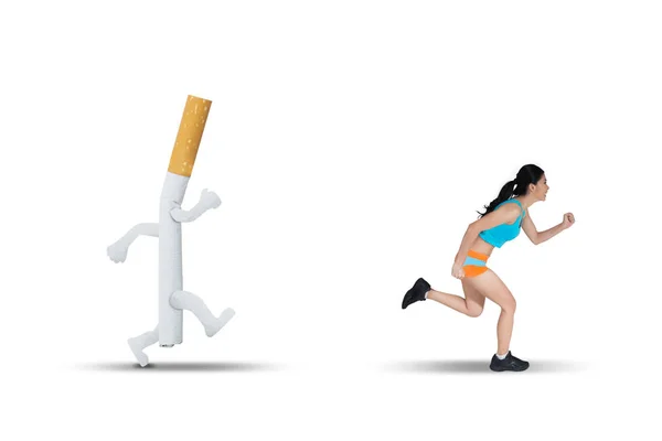 Asian woman running away from a cigarette — Stock Photo, Image