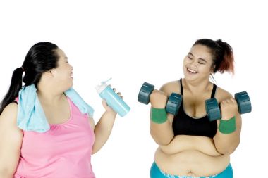 Kadınlar egzersiz halter ile yapmak