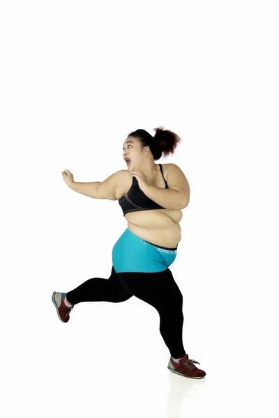 Overweight woman looks afraid — Stock Photo, Image