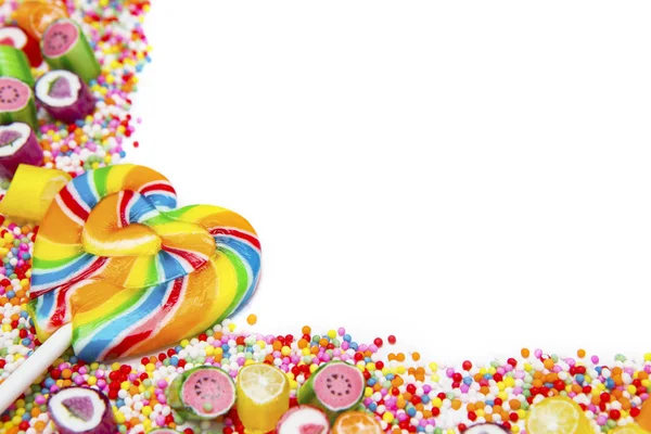 Leckere bunte Bonbons und Lutscher — Stockfoto