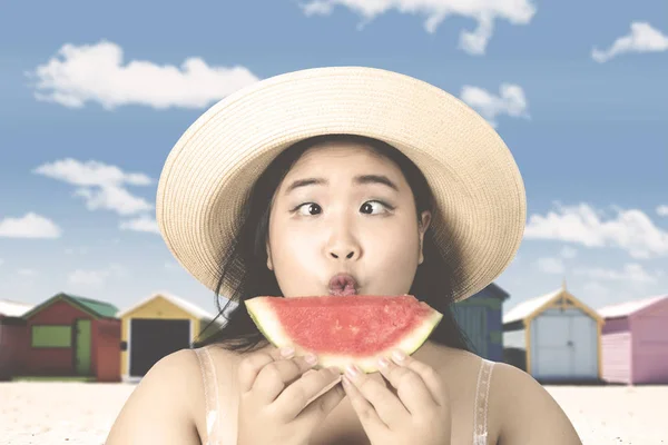 Woman with squint-eyed and watermelon — Stock Photo, Image