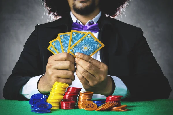 Male gambler playing poker cards — Stock Photo, Image
