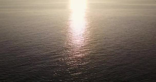 Calm ocean with sunset reflection — Stock Video