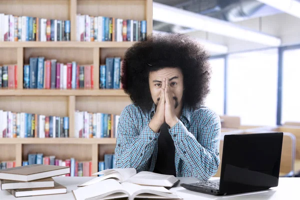 Afro student looks tired in the classroom — Stock Photo, Image