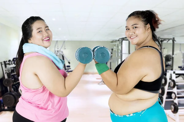 Attractive fat women doing workout — Stock Photo, Image