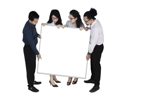 Group of business people with billboard — Stock Photo, Image