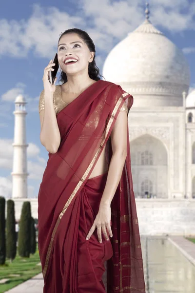 Indian woman speaking on smartphone — Stock Photo, Image