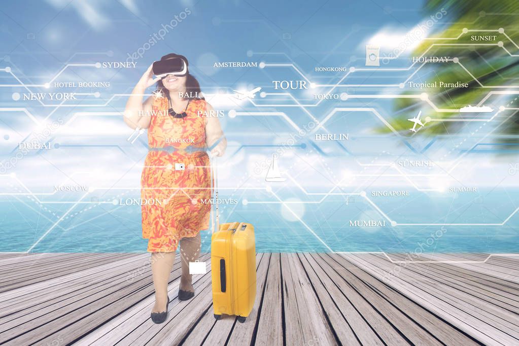 Woman uses VR glasses at pier