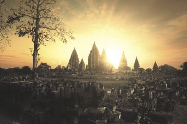 Beautiful sunset at ancient Prambanan temple clipart