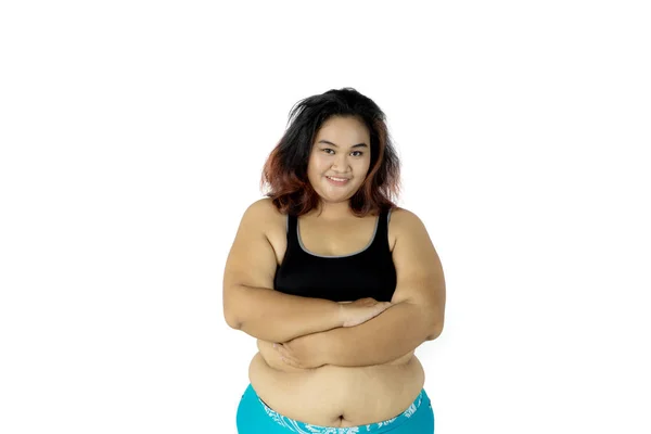 Mulher gorda parece confiante no estúdio — Fotografia de Stock