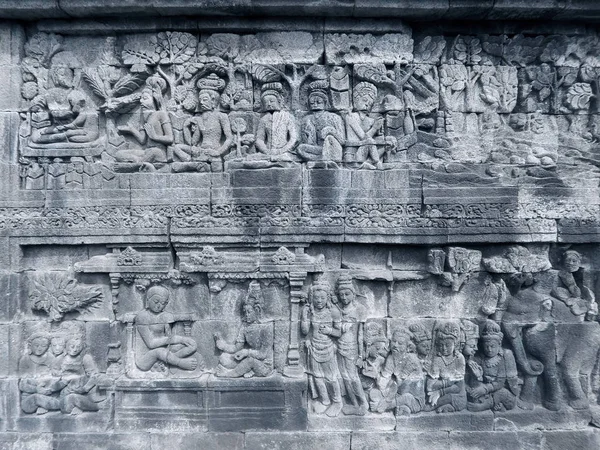 Kamienne rzeźbione płaskorzeźby z świątyni Borobudur — Zdjęcie stockowe