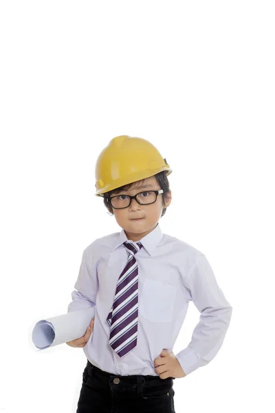 Roztomilý chlapec s blueprint a helma — Stock fotografie