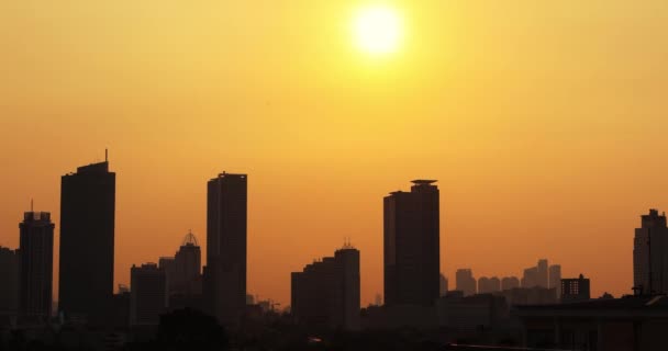 Motie van Jakarta stad landschap stoppen bij zonsondergang — Stockvideo