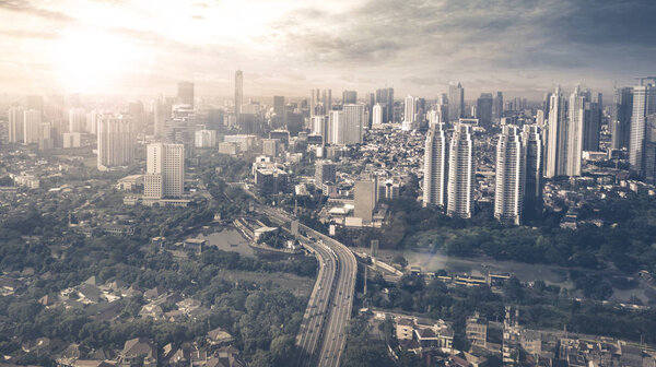 Aerial view city of Jakarta at sunset time