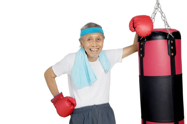 Happy elderly male resting after exercise — Stock Photo, Image