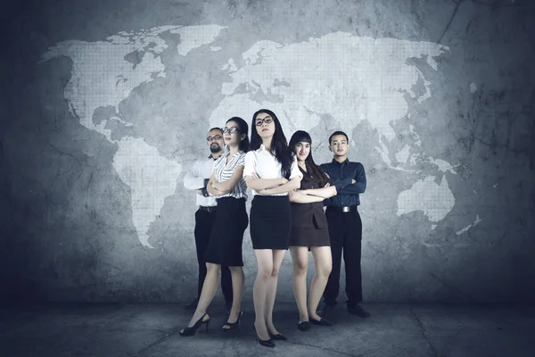 Successful business people with world map — Stock Photo, Image