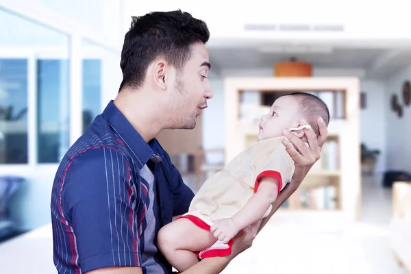 Happy father smiling with his son — Stock Photo, Image