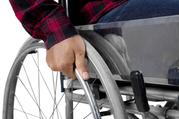 Hombre discapacitado con una silla de ruedas en el estudio —  Fotos de Stock