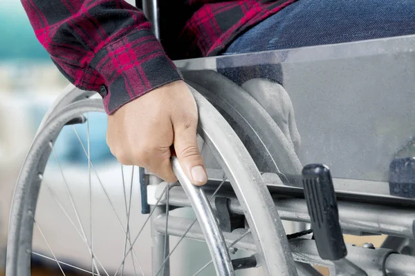 Disabled man using a wheelchair — Stock Photo, Image