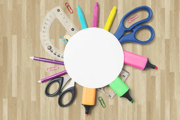 School supplies with empty rounded paper — Stock Photo, Image