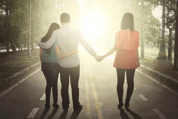 Young man cheating with his friend — Stock Photo, Image