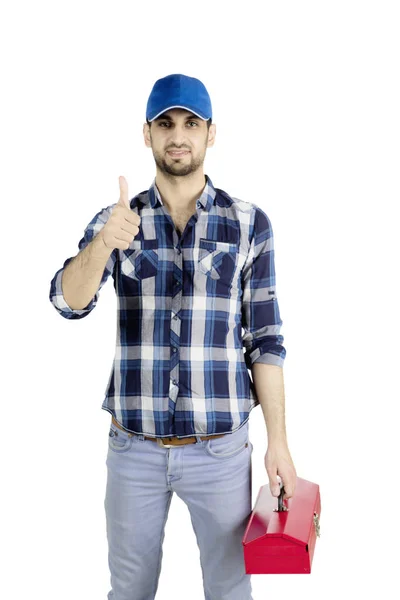 Fontanero dando un pulgar arriba en el estudio — Foto de Stock