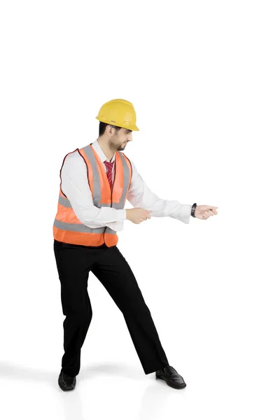 Italian engineer pull something on studio — Stock Photo, Image