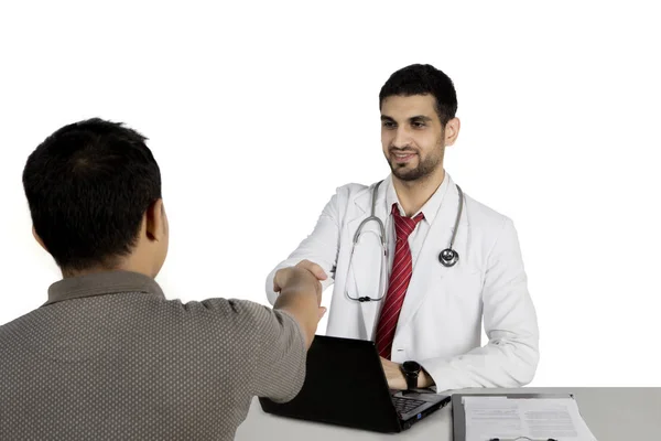 Italian doctor handshake with his patient on studio — Stock Photo, Image