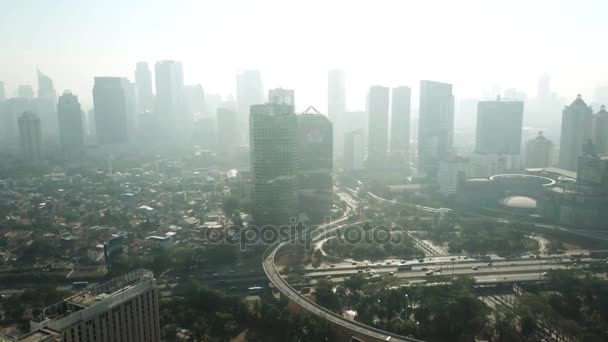 Drone view of Semanggi bridge and skyscrapers — Stock Video