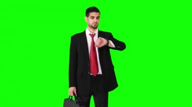 İşadamı birisi bekleme zamanını denetleme