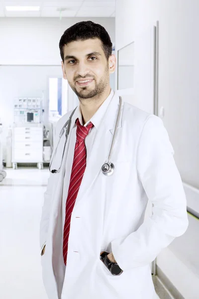 Italian doctor standing in the hospital corridor — Stock Photo, Image