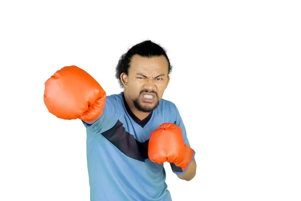 African man throwing a punch on the camera — Stock Photo, Image