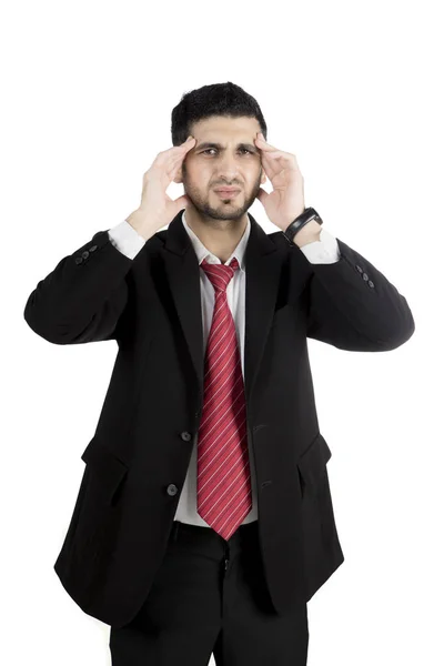 Arabo uomo d'affari avendo un mal di testa in studio — Foto Stock