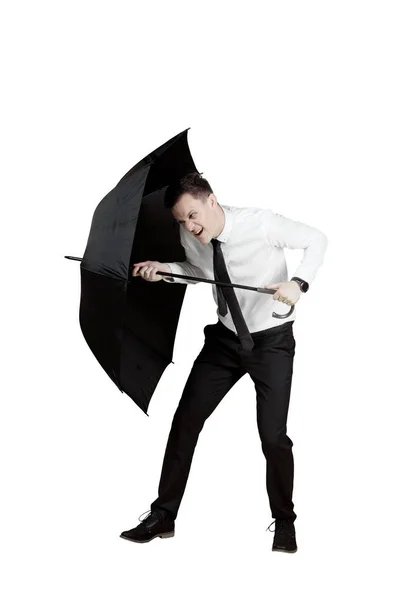 Uomo d'affari europeo con ombrello in studio — Foto Stock