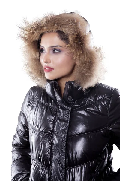 Beautiful woman with winter jacket on studio — Stock Photo, Image