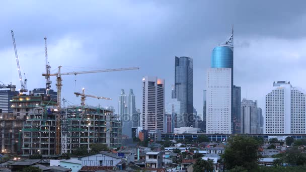 Timelapse of crane and buildings under construction — Stock Video