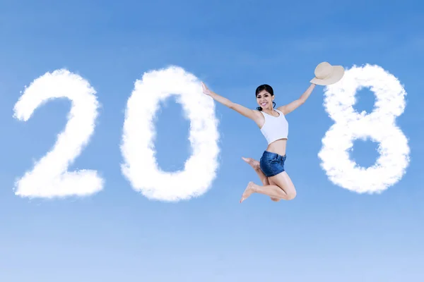 Chica bonita volando con números 2018 —  Fotos de Stock