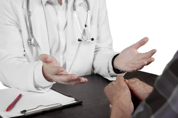 Anonymous doctor talking with elderly patient — Stock Photo, Image