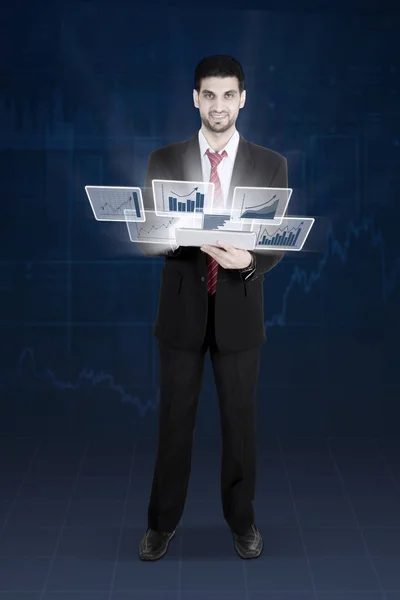 Arabian entrepreneur with virtual screen — Stock Photo, Image