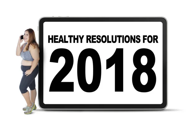 Mujer gorda con sus resoluciones para 2018 —  Fotos de Stock