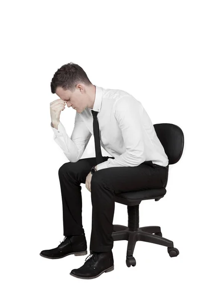 Depressed businessman frowning on studio — Stock Photo, Image