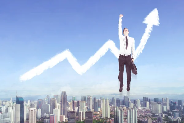 Hombre de negocios americano volando con flecha hacia arriba — Foto de Stock