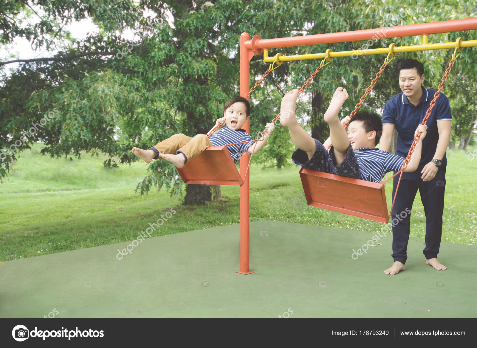 Father And Children Playing With Swings Stock Photo By C Realinemedia Father And Children Playing With Swings Stock Photo By C Realinemedia