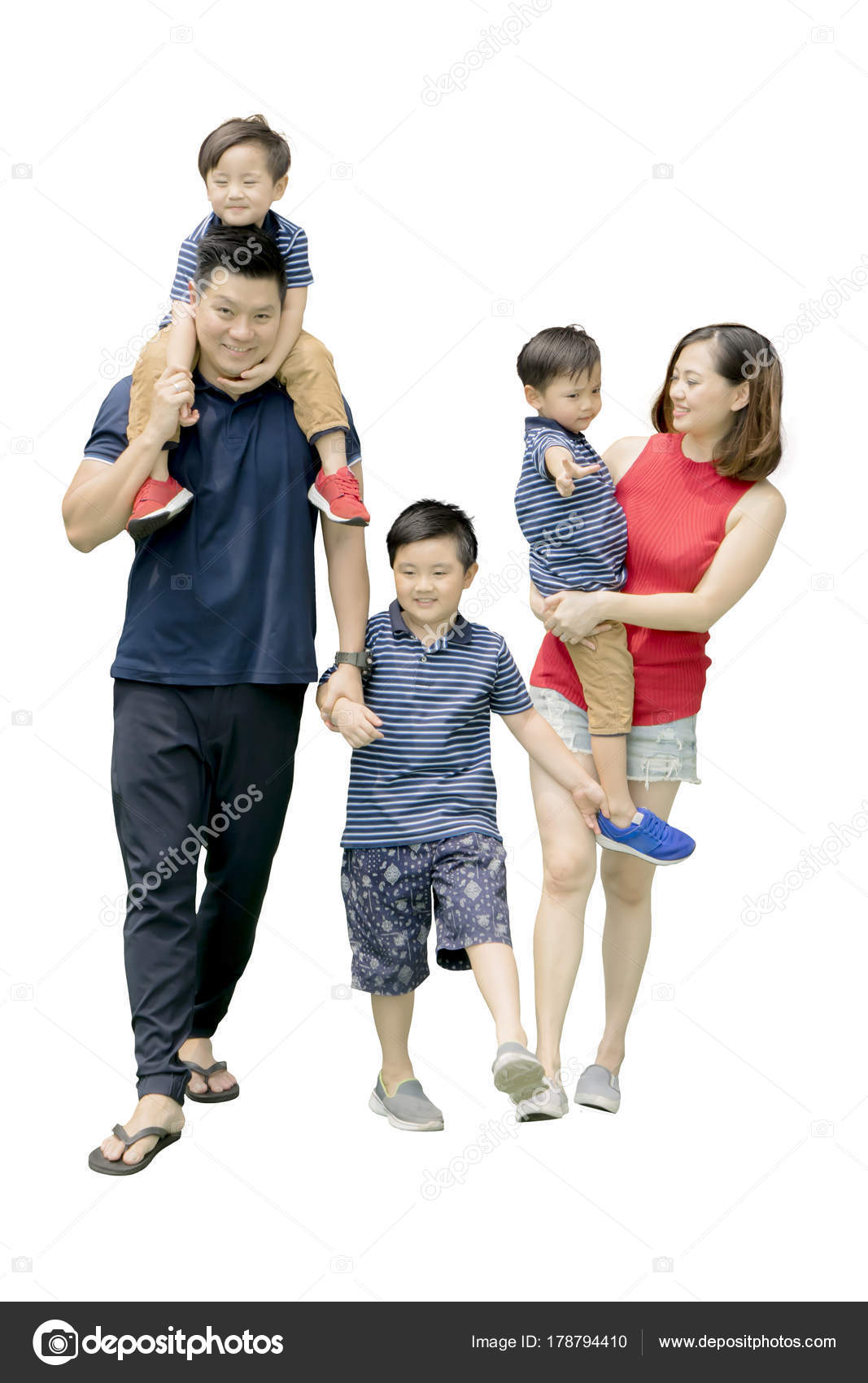 Portrait Of Happy Family Walking Over White Background Against