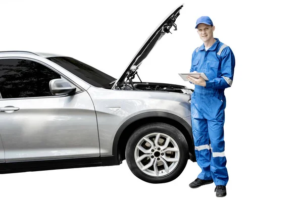 American mechanic with broken car and tablet — Stock Photo, Image