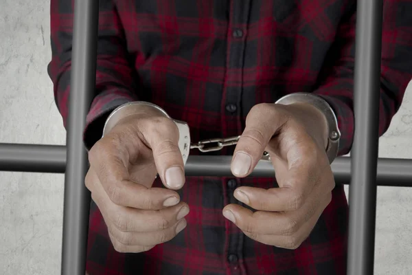 Unknown prisoner with handcuffs in the jail — Stock Photo, Image
