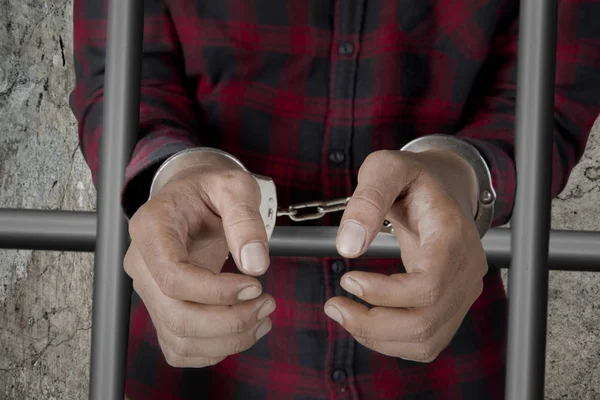 Male prisoner with handcuffs in the jail — Stock Photo, Image