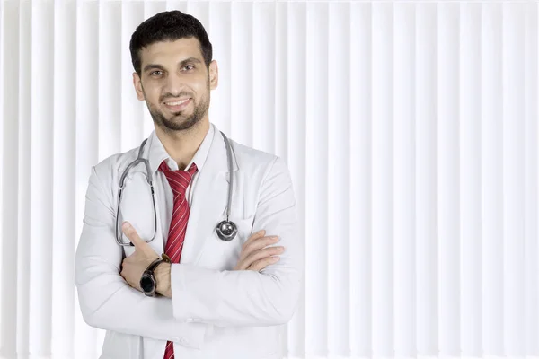 Italian doctor folded his arms in the clinic — Stock Photo, Image