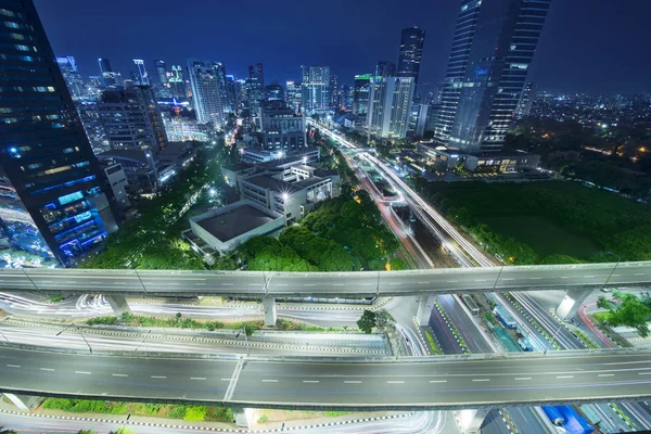 Yakarta paisaje urbano por la noche — Foto de Stock